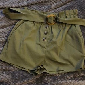 Green belted shorts
